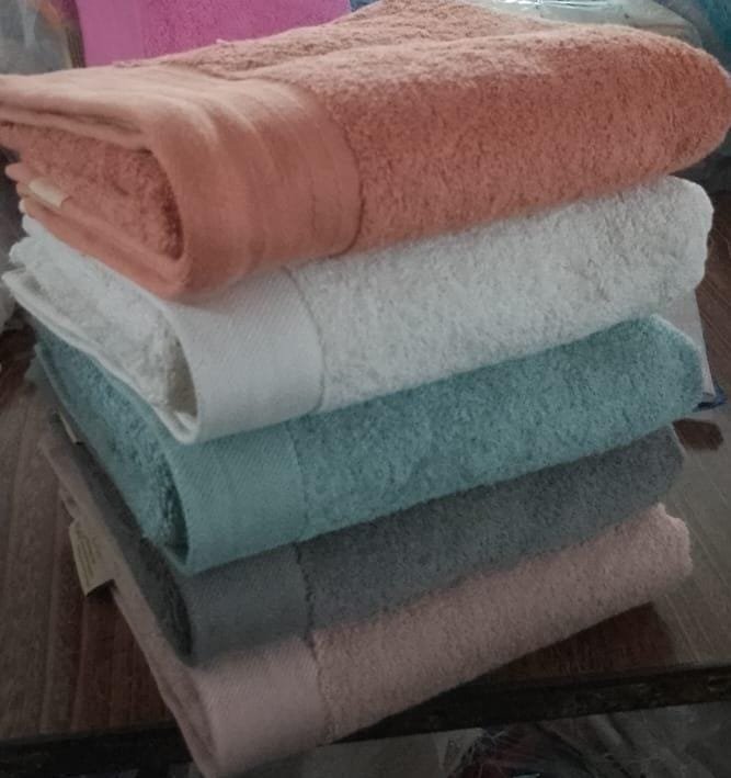 White cotton terry towels manufactured for Australian hotels and hospitality suppliers